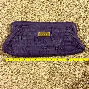 Bebe purple clutch gently used